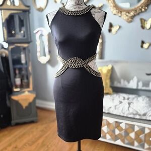 Glamorous Black Mini Dress with Gold Beaded Cutouts